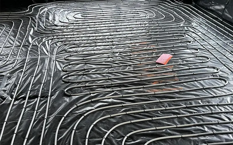 underfloor heating system installed beneath stone and tile flooring in Monmouthshire home