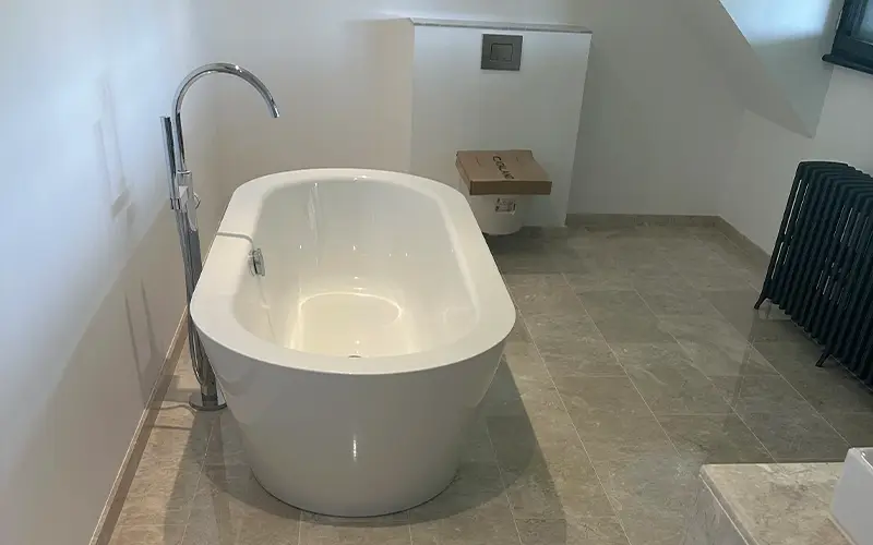 Bathroom refurbishment and wet room installation with waterproof tanking and tiling in Monmouthshire home